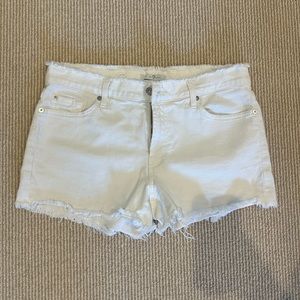 7 for all mankind white jean shorts with fringe detailing